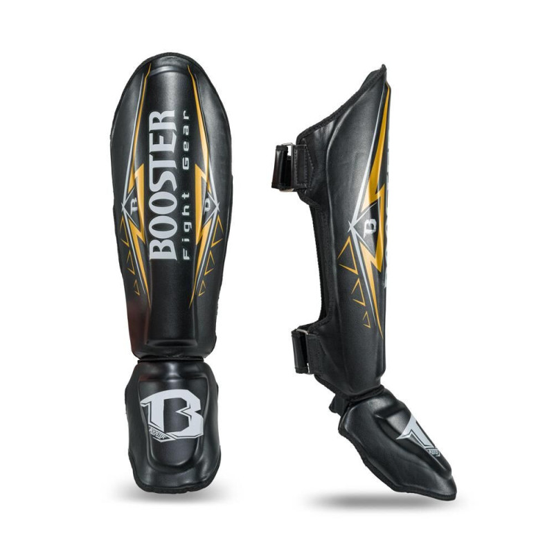 Protège-tibias Booster Fight Gear | Noir/Or/Blanc | Warrior Series